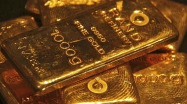 Gold prices fall from record highs, but risk aversion limits losses
