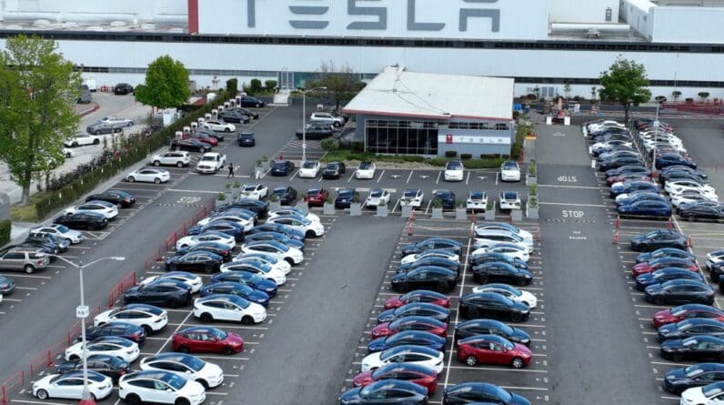 Tesla settles discrimination case with ex-employee