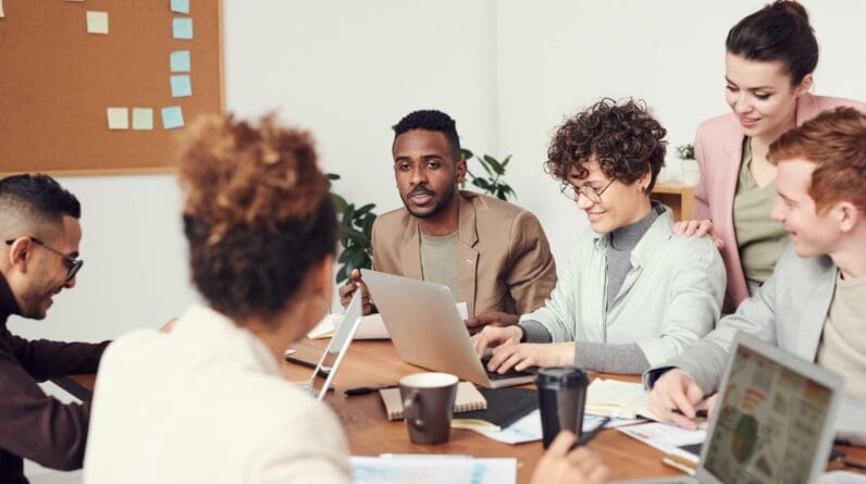 Co-workers around a table